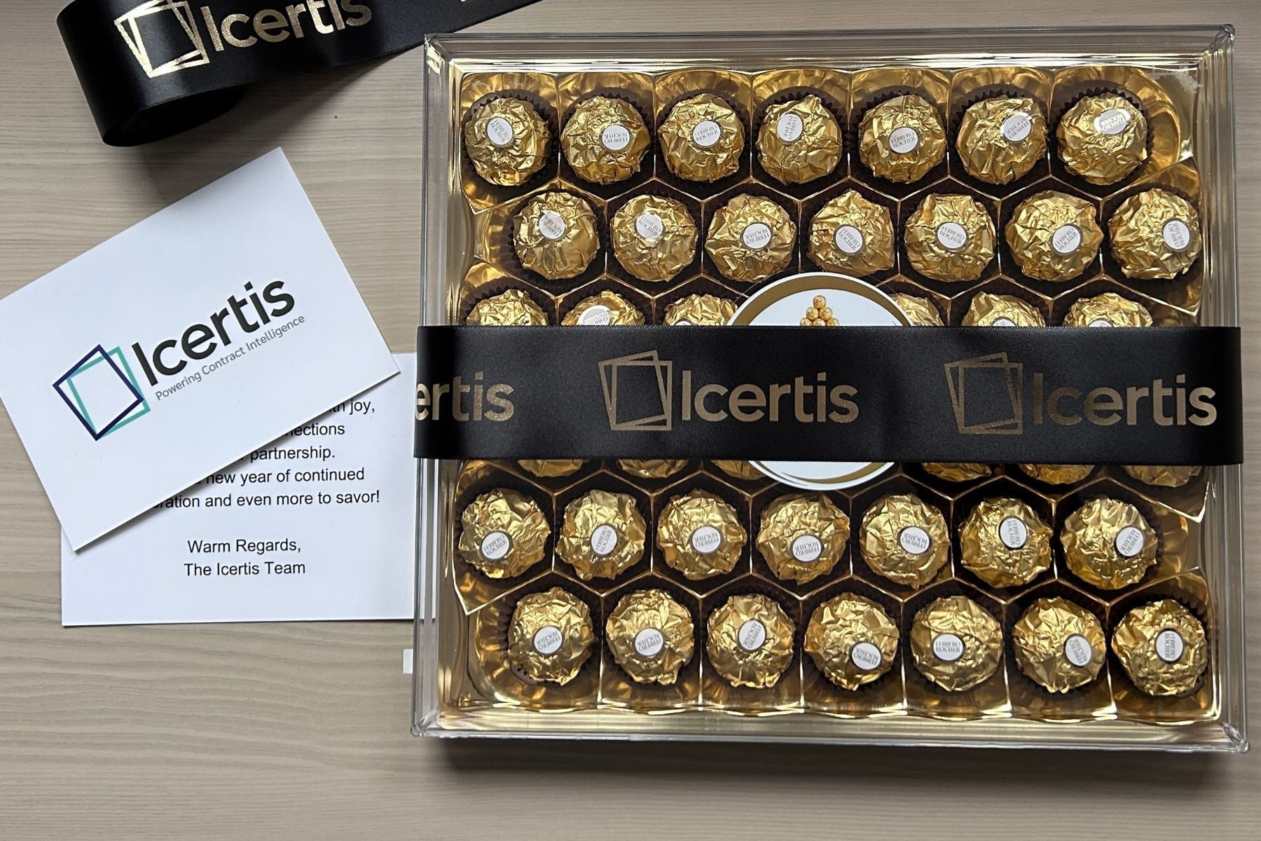 branded chocolate box, ribbon and card