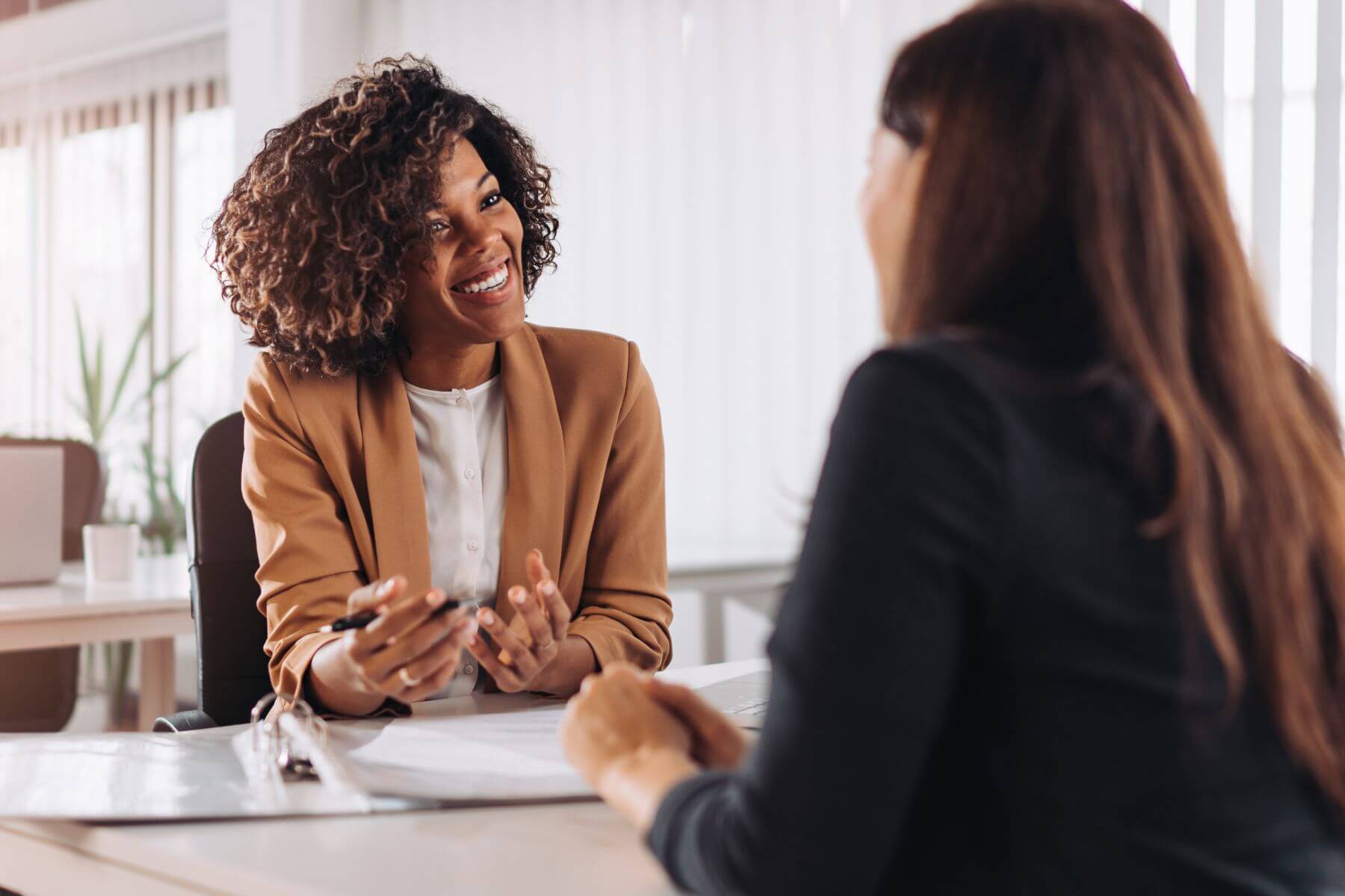 two women having a client meeting