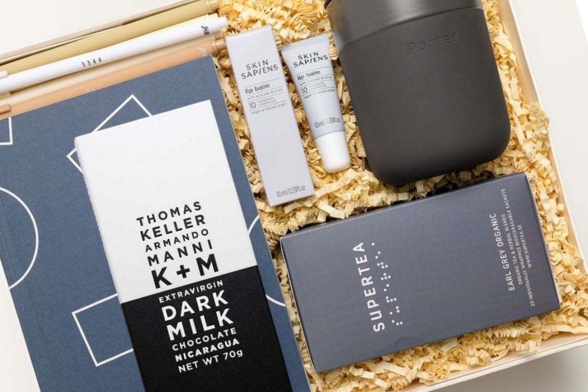 blue and black office gifts in a box