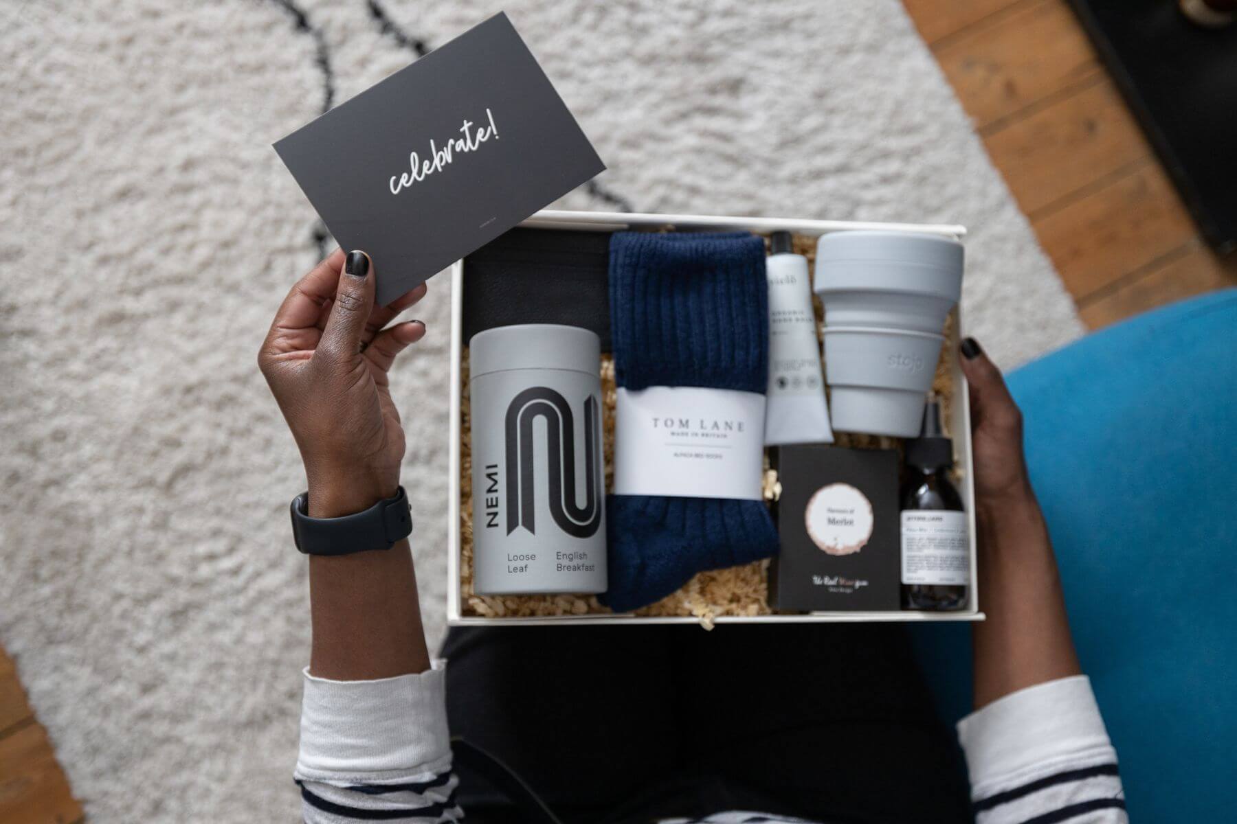 Unique Corporate Gift Ideas of tea, socks, sweets, mug and hand cream
